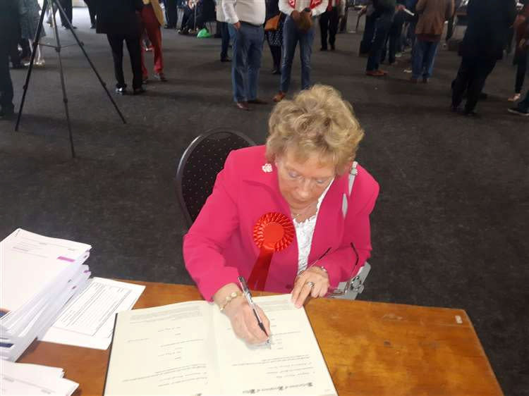 Cllr Margaret Rose. See SWNS story SWNNraid. A 75 year old magistrate and councillor who sits on her local crime and disorder committee has complained to police after they forced their way into her home looking for two rape suspects -  but had the wrong address. Cllr Margaret Rose, who lives alone, was woken by mob-handed officers with riot shields trying to force their way into her flat. But cops were left red-faced when they realised they burst into the wrong property in Maidstone, Kent. The shocked pensioner, who takes medication for a heart problem, said she was almost knocked over when three burly officers suddenly barged into her hallway.  