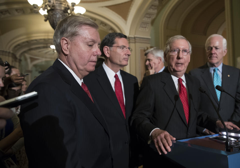 Senate Republicans speak to reporters after announcing that the Graham-Cassidy bill, the GOP’s latest attempt to repeal Obamacare, would not go to a vote on the Senate floor. The decision marked the latest defeat on the issue for President Trump and the Republican-controlled Congress. (AP Photo/J. Scott Applewhite)