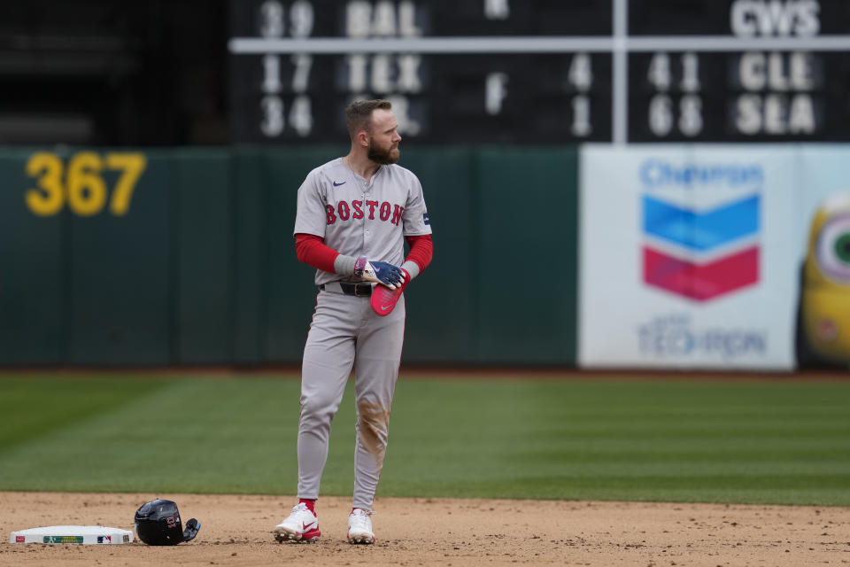 Boston Red Sox's Trevor Story stands on the field after being forced out at second during the eighth inning of a baseball game Oakland Athletics, Wednesday, April 3, 2024, in Oakland, Calif. (AP Photo/Godofredo A. Vásquez)