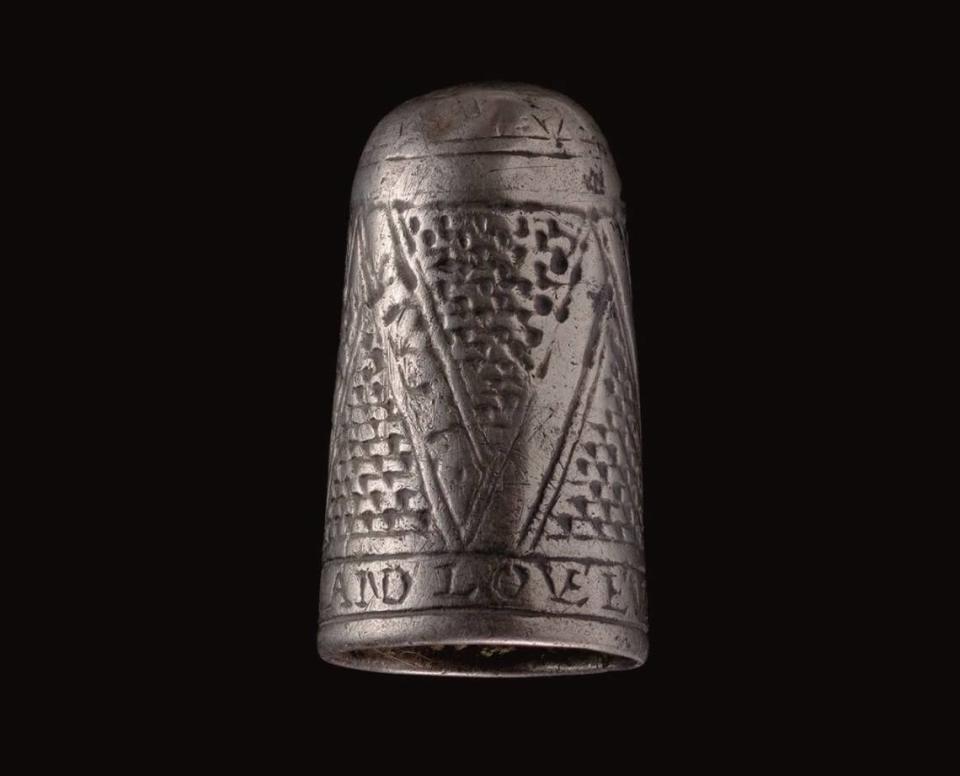 The ancient silver thimble has a Roman engraving at the bottom of its body, experts said.