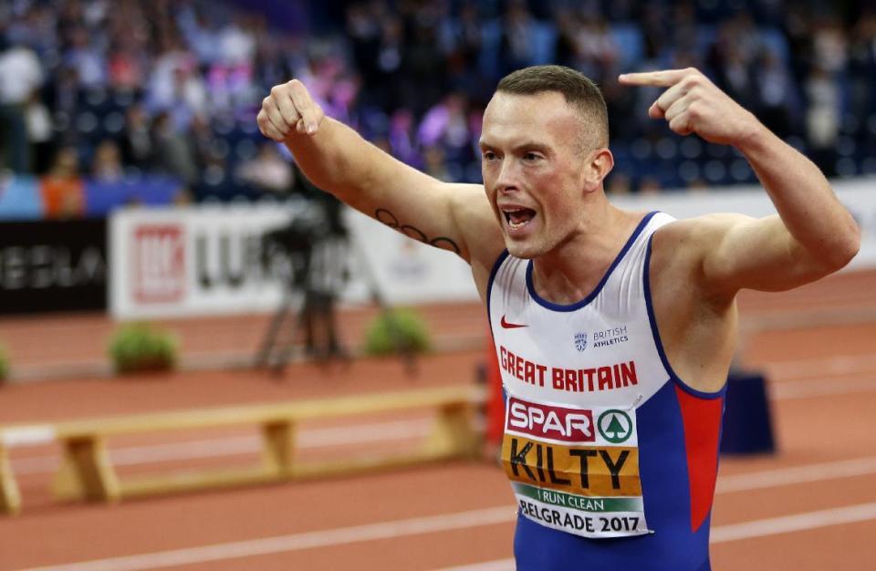 Britain's Richard Kilty celebrates winning the men's 60-meter final during the European Athletics Indoor Championships in Belgrade, Serbia, Saturday, March 4, 2017. (AP Photo/Marko Drobnjakovic)