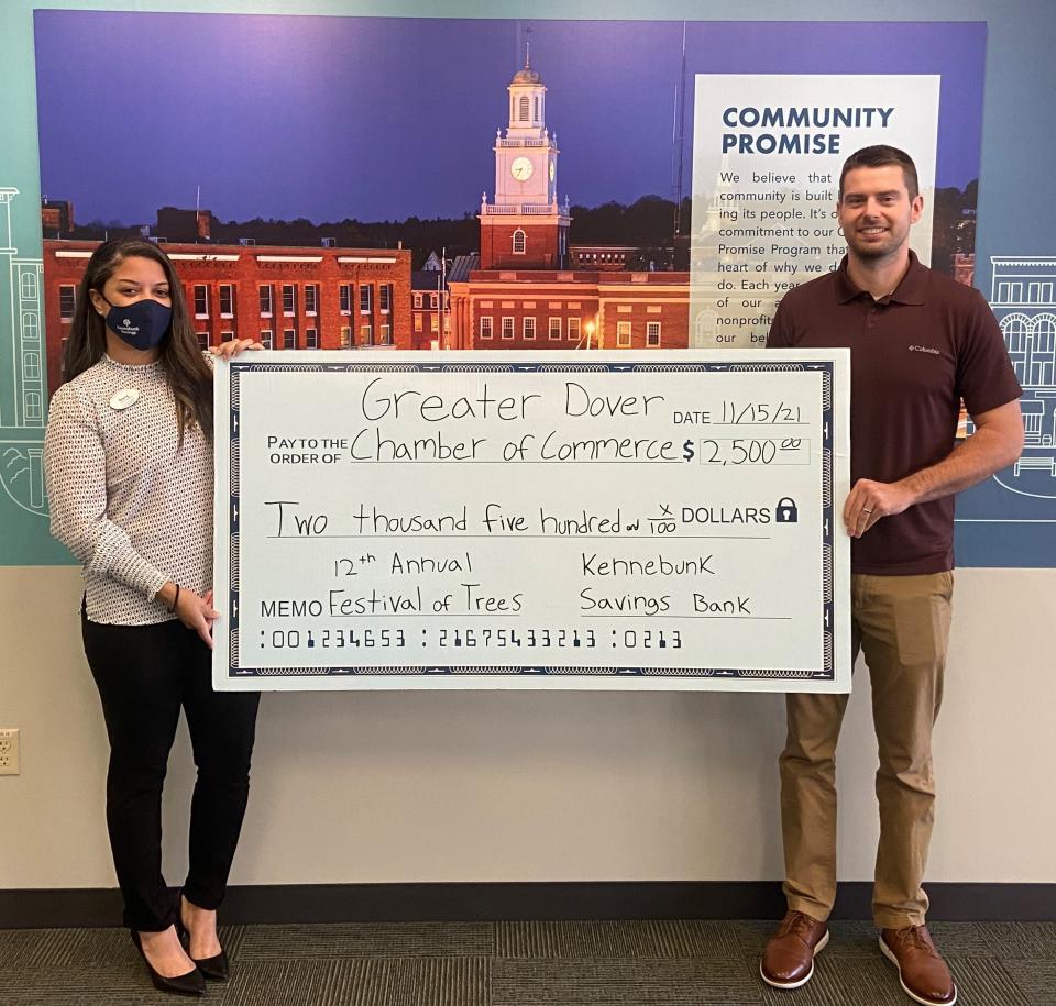 Kennebunk Savings will serve as the underwriter for the 2021 Festival of Trees in Dover. Pictured, left to right, is Assistant Vice President and Branch Manager of Kennebunk Savings Dory Polanco presenting a check to GDCC Community Events Manager Morgan Faustino.