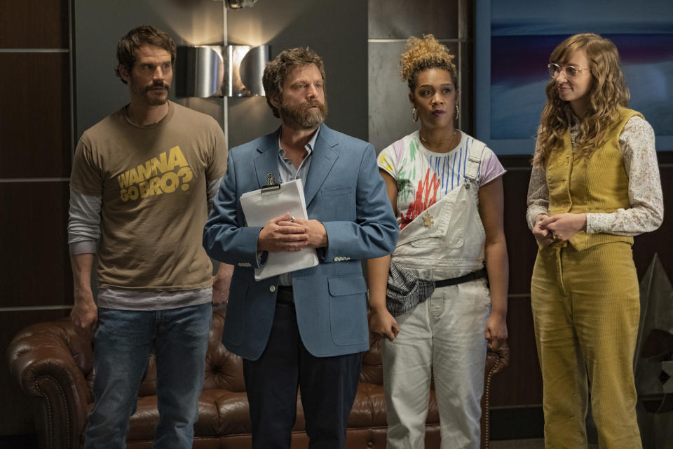 This image released by Netflix shows Ryan Gaul, from left, Zach Galifianakis, Jiavani Linayao and Lauren Lapkus in "Between Two Ferns: The Movie." (Adam Rose/Netflix via AP)