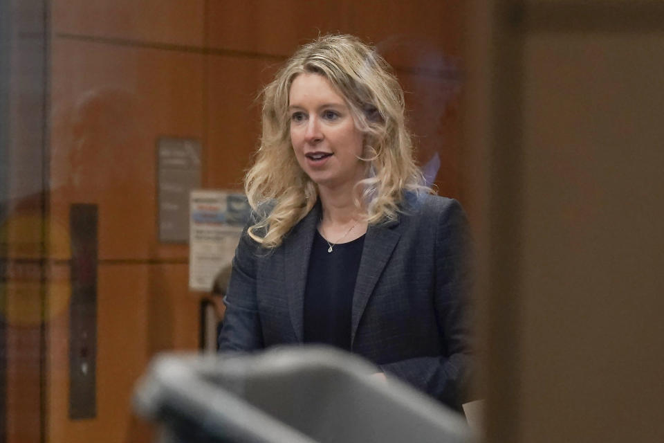 FILE - Former Theranos CEO Elizabeth Holmes arrives at federal court in San Jose, Calif., on Oct. 17, 2022. Ramesh “Sunny” Balwani, a former Theranos executive, learns Wednesday, Dec. 7, 2022, whether he will be punished as severely as Holmes, his former lover and business partner, for peddling the company's bogus blood-testing technology that duped investors and endangered patients. (AP Photo/Jeff Chiu, File)