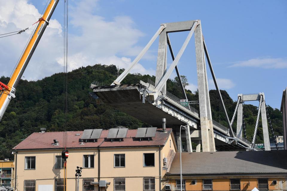 A view of the collapsed Morandi highway bridge, in Genoa, Italy, Friday, Aug. 17, 2018. Officials say 38 people are confirmed killed and 15 injured. Prosecutors say 10 to 20 people might be unaccounted-for and the death toll is expected to rise. (Luca Zennaro/ANSA via AP)