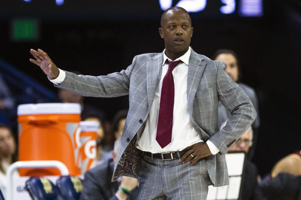 Boston College head coach Earl Grant holds up his hand during an NCAA college basketball game against Notre Dame Saturday, Jan. 21, 2023 in South Bend, Ind. (AP Photo/Michael Caterina)