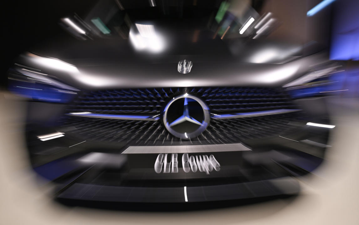 22 February 2024, Baden-Württemberg, Stuttgart: A logo of the automobile manufacturer Mercedes-Benz is attached to the front of a Mercedes-Benz CLE Coupé (wiping effect by zooming at a short shutter speed). Photo: Bernd Weißbrod/dpa (Photo by Bernd Weißbrod/picture alliance via Getty Images)