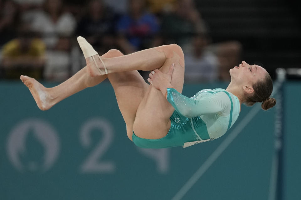 Ana Barbosu, of Romania, competes during the women's artistic gymnastics individual floor finals at Bercy Arena at the 2024 Summer Olympics, Monday, Aug. 5, 2024, in Paris, France. (AP Photo/Charlie Riedel)