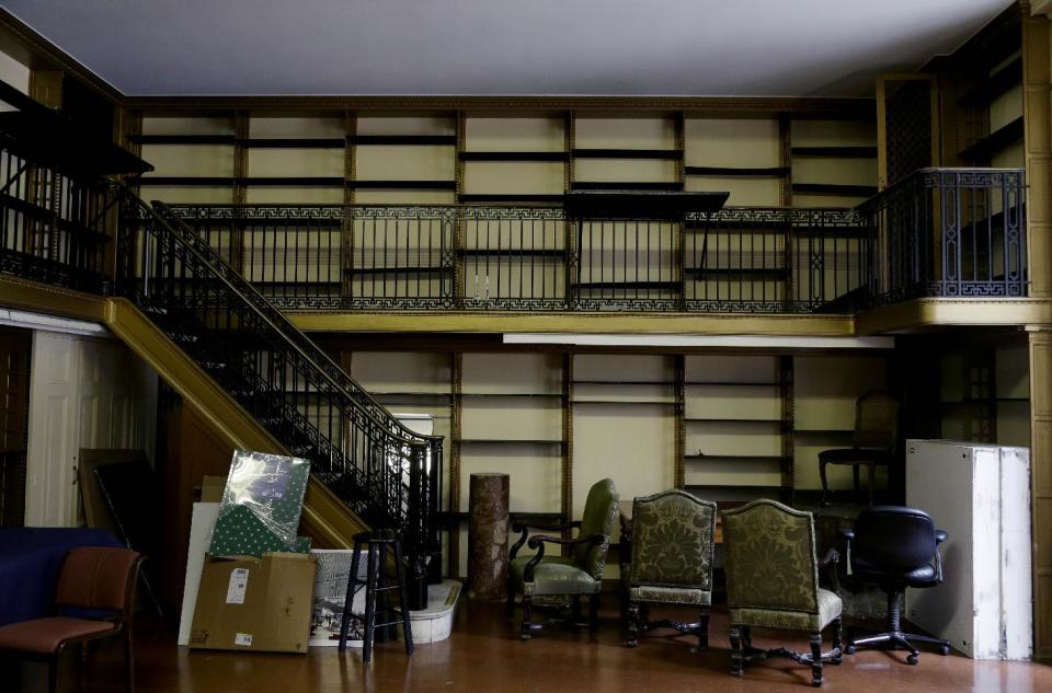 In this Monday, July 22, 2013 photo, an empty room is used for storage at the main branch of the New York Public Library in New York. Plans for a major change within the New York Public Library’s landmark main building have kindled an intellectual culture clash over its direction and the future of libraries themselves. (AP Photo/Seth Wenig)