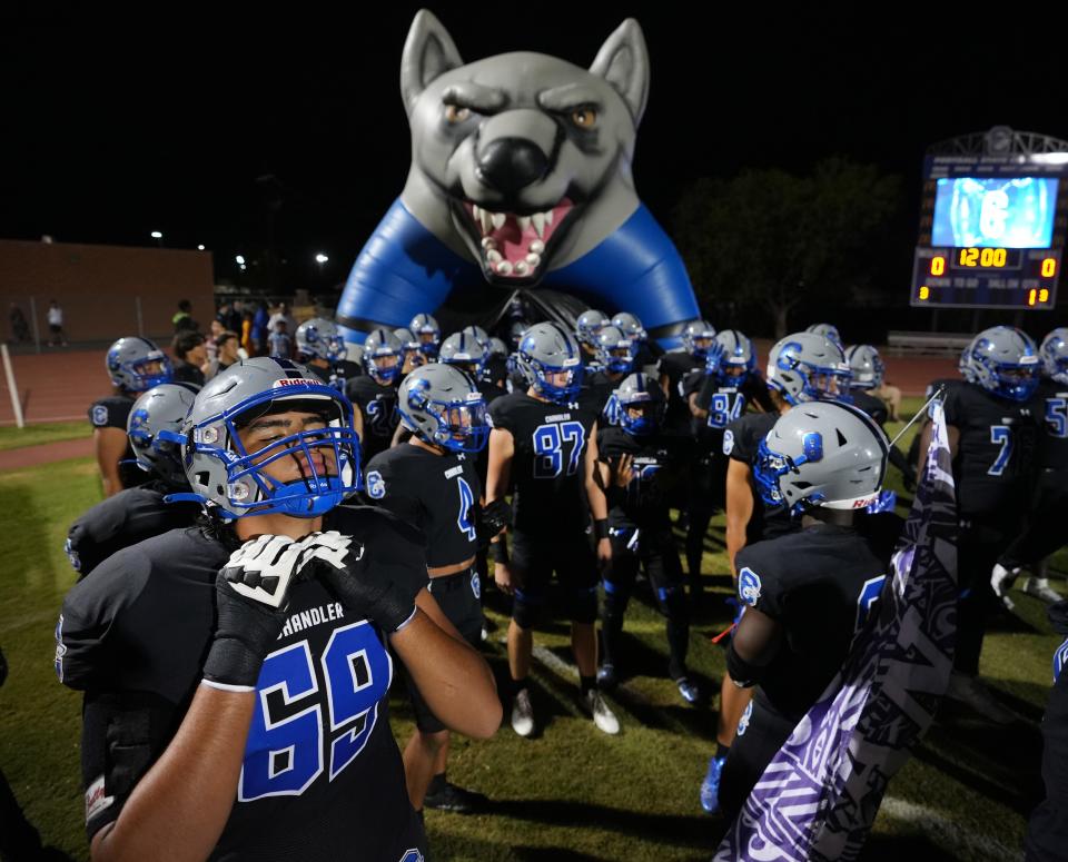 Chandler's Mateo Rodriguez (69) prepares to take the field with his teammates against Corona del Sol during their game at Chandler High School on Friday, Sept. 9, 2022.