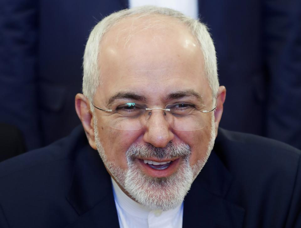 FILE - In this May 14, 2018, file photo, Iranian Foreign Minister Mohammad Javad Zarif smiles as he speaks to Russian Foreign Minister Sergey Lavrov during their meeting in Moscow, Russia. A recording of Iran's foreign minister offering a blunt appraisal of diplomacy and the limits of power within the Islamic Republic has leaked out publicly, providing a rare look inside the country's theocracy. (Maxim Shemetov/Pool Photo via AP, File)