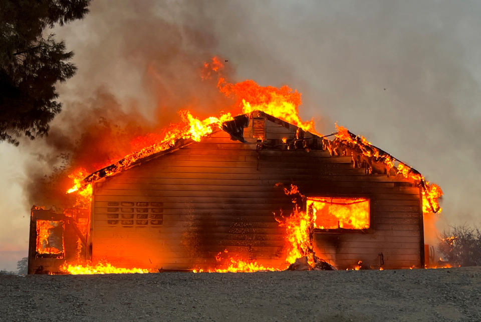 A burning house in the Fairview Fire.