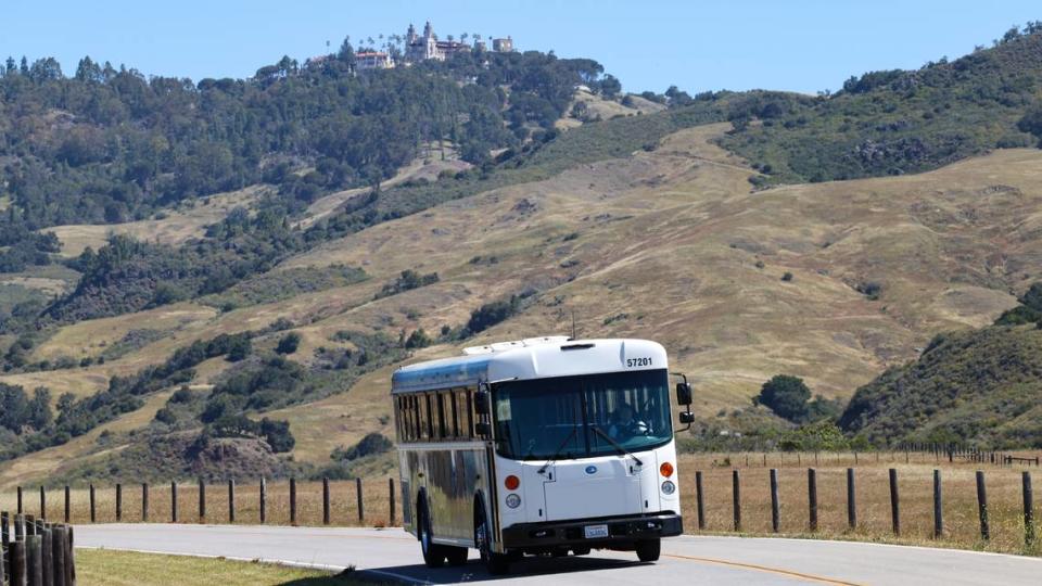 A tour bus drives back to the visitor center on May 11, 2022, after Hearst Castle reopened to guests following a two-year closure due to COVID-19 and road repairs.