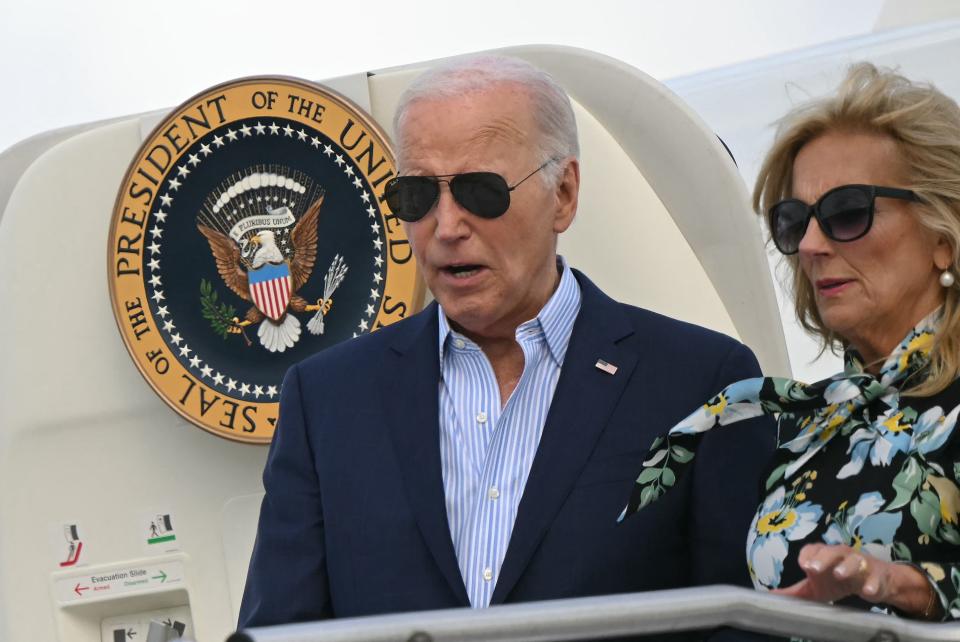 President Joe Biden and First Lady Jill Biden step off Air Force One upon arrival at McGuire Air Force Base in New Jersey on June 29, 2024. Biden is in New Jersey for campaign fundraisers.