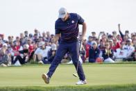 Team USA's Bryson DeChambeau reacts after making a putt on the 15th hole during a four-ball match the Ryder Cup at the Whistling Straits Golf Course Friday, Sept. 24, 2021, in Sheboygan, Wis. (AP Photo/Jeff Roberson)