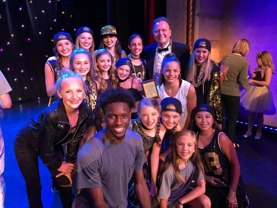 Kip Tyner, top right in tuxedo, with some contestants from the 2017 Talent Search.