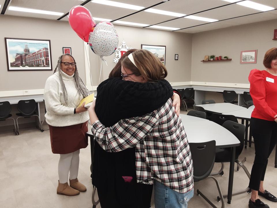 Richmond High School senior Olivia Dudas (right) hugs her mom Andrea Dudas after finding out she was one of two Wayne County recipients of the 2024 Lilly Endowment Community Scholarship, Wednesday, Dec. 6, 2023.