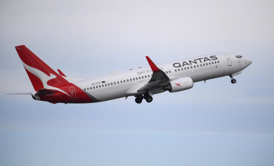 SYDNEY, AUSTRALIA - NOVEMBER 16: A Qantas Boeing 737-800 aircraft takes off at Sydney's Kingsford Smith Airport on November 16, 2020 in Sydney, Australia. Australia's national airline Qantas is celebrating 100 years of operation today having been founded in Winton, Queensland on 16th November 1920 named as Queensland and Northern Territory Aerial Services Limited by Paul McGinness and Hudson Fysh. (Photo by James D. Morgan/Getty Images)