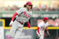 Philadelphia Phillies' Alec Bohm rounds third base on the way to scoring on a Nick Castellanos single during the third inning of the team's baseball game against the Cincinnati Reds on Monday, Aug. 15, 2022, in Cincinnati. (AP Photo/Jeff Dean)