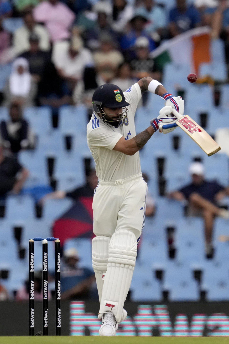 India's batsman Virat Kohli plays a high ball from South Africa's bowler Nandre Burger during the first day of the Test cricket match between South Africa and India, at Centurion Park, South Africa, Tuesday, Dec. 26, 2023. (AP Photo/Themba Hadebe)