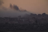 Smoke rises after an explosion in the Gaza Strip as seen from southern Israel, Tuesday, Jan. 16, 2024. (AP Photo/Leo Correa)