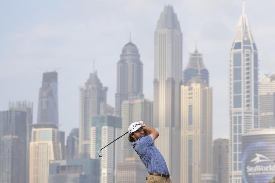 Cameron Young of the U.S. plays his second shot on 13th hole during the second round of the Hero Dubai Desert Classic golf tournament, in Dubai, United Arab Emirates, Friday, Jan. 19, 2024. (AP Photo/Kamran Jebreili)