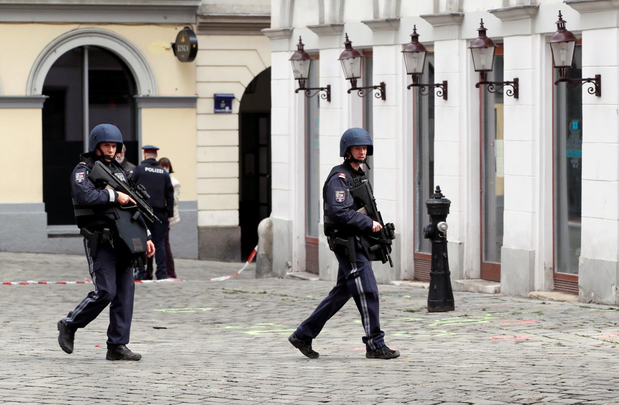 Officers in Vienna are seen patrolling the streets on Tuesday after the suspected terror attack a day before (REUTERS)