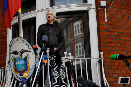 FILE PHOTO: WikiLeaks founder Julian Assange is seen on the balcony of the Ecuadorian Embassy in London, Britain, May 19, 2017. REUTERS/Peter Nicholls/File Photo