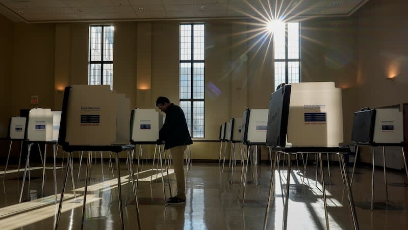 A voter fills out their Ohio primary election ballot at a polling location in Knox Presbyterian Church in Cincinnati, Ohio, on Tuesday, March 19, 2024.