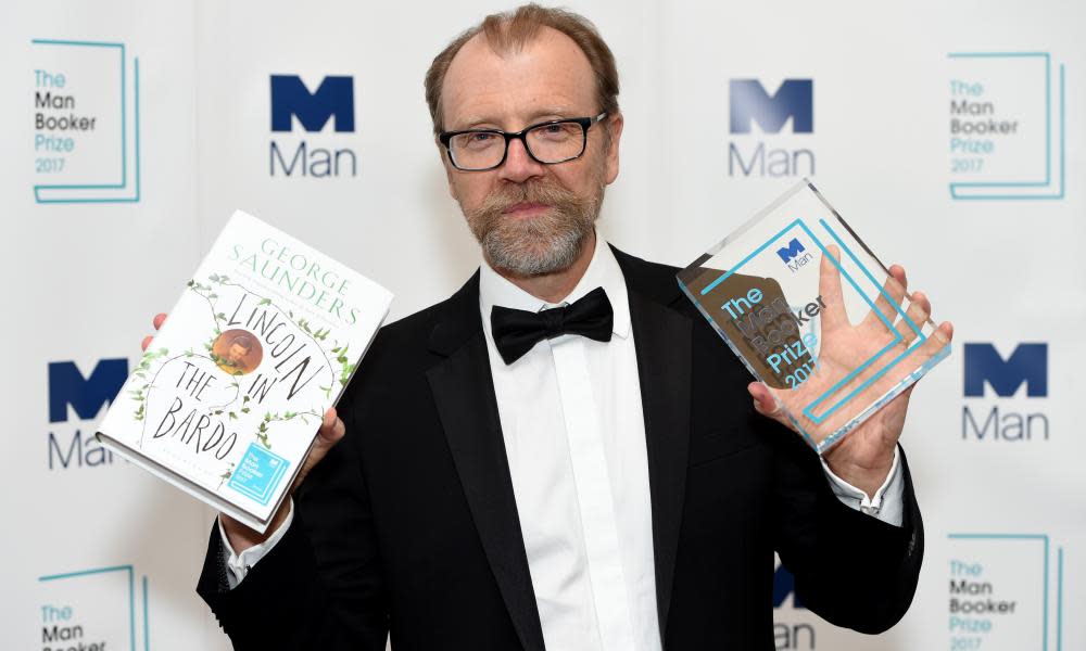 George Saunders with the Booker prize he won for the novel Lincoln In The Bardo.