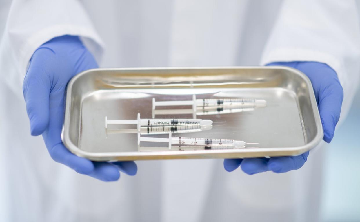 <span class="caption">As coronavirus cases surge, unvaccinated people are accounting for nearly all hospitalizations and deaths. </span> <span class="attribution"><a class="link " href="https://www.gettyimages.com/detail/photo/tray-of-medical-syringes-stock-photo-royalty-free-image/1214323561?adppopup=true" rel="nofollow noopener" target="_blank" data-ylk="slk:Fat Camera/E+ via Getty Images;elm:context_link;itc:0;sec:content-canvas">Fat Camera/E+ via Getty Images</a></span>