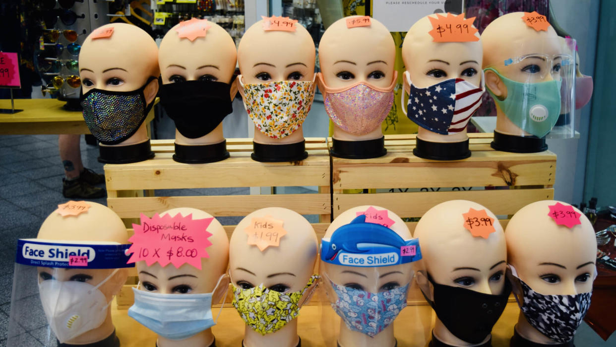 FRESNO, UNITED STATES - Jun 08, 2020: An editorial and illustrative photo of mannequins wearing COVID 19 face masks of different patterns and colors for sale at a Mall in Fresno,Ca.
