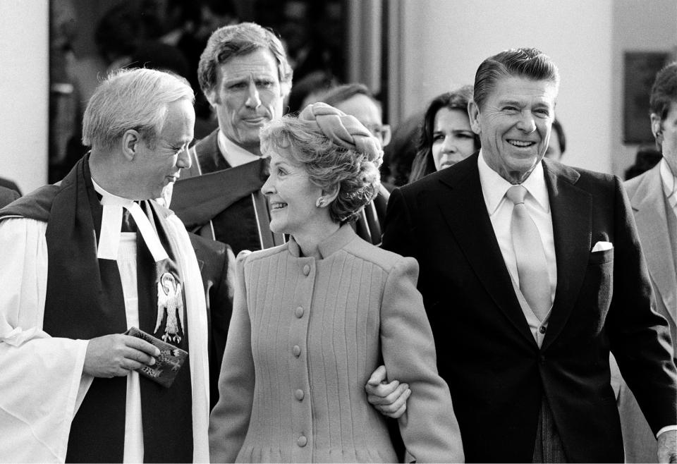 FILE - In this January 1981 file photo, President-elect Ronald Reagan and his wife, first lady Nancy, leave St. John's Church in Washington, after attending services. The Greek Revival house of worship was consecrated in 1816 and often dubbed “the Church of the Presidents” for having hosted every leader since James Madison for at least one service. (AP Photo)