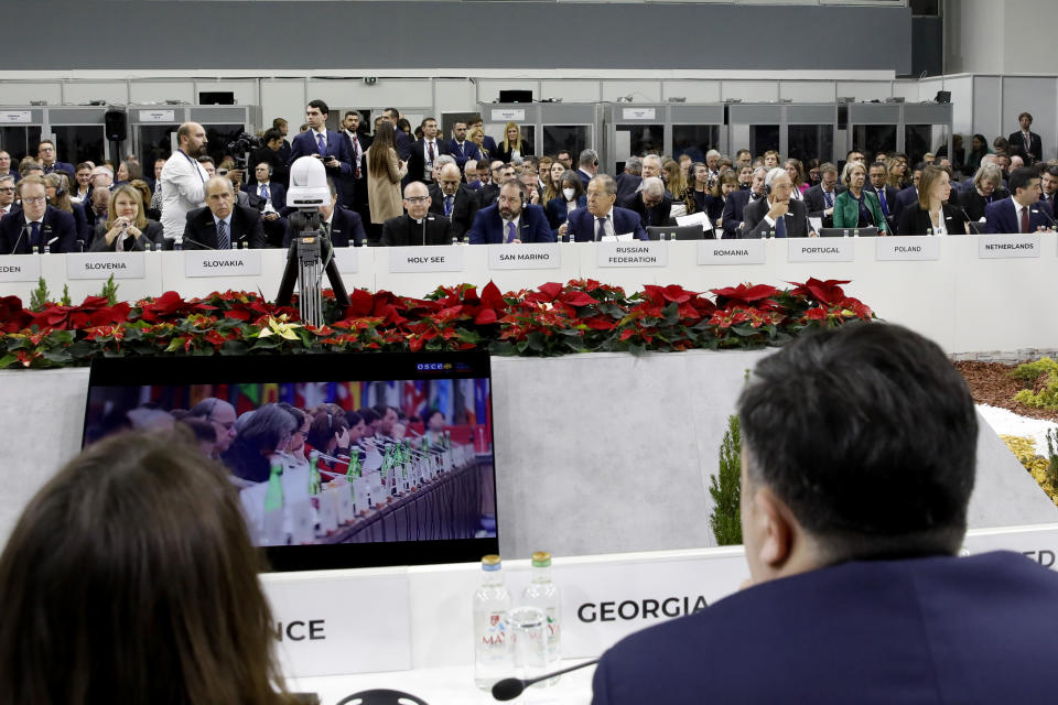 Russia's Foreign Minister Sergey Lavrov, center right in rear row, attends the plenary session of the OSCE (Organization for Security and Co-operation in Europe) Ministerial Council meeting, in Skopje, North Macedonia, on Thursday, Nov. 30, 2023. (AP Photo/Boris Grdanoski)