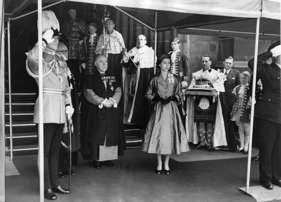 Queen Elizabeth II arrives at St. Giles' Cathedral for the Scottish National Service of Thanksgiving and Dedication on June 24, 1953.