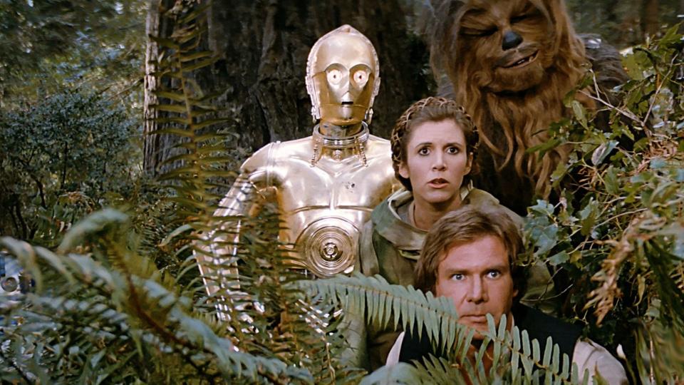 C-3PO, Leia, Han, and Chewbacca in Star Wars: Return of the Jedi