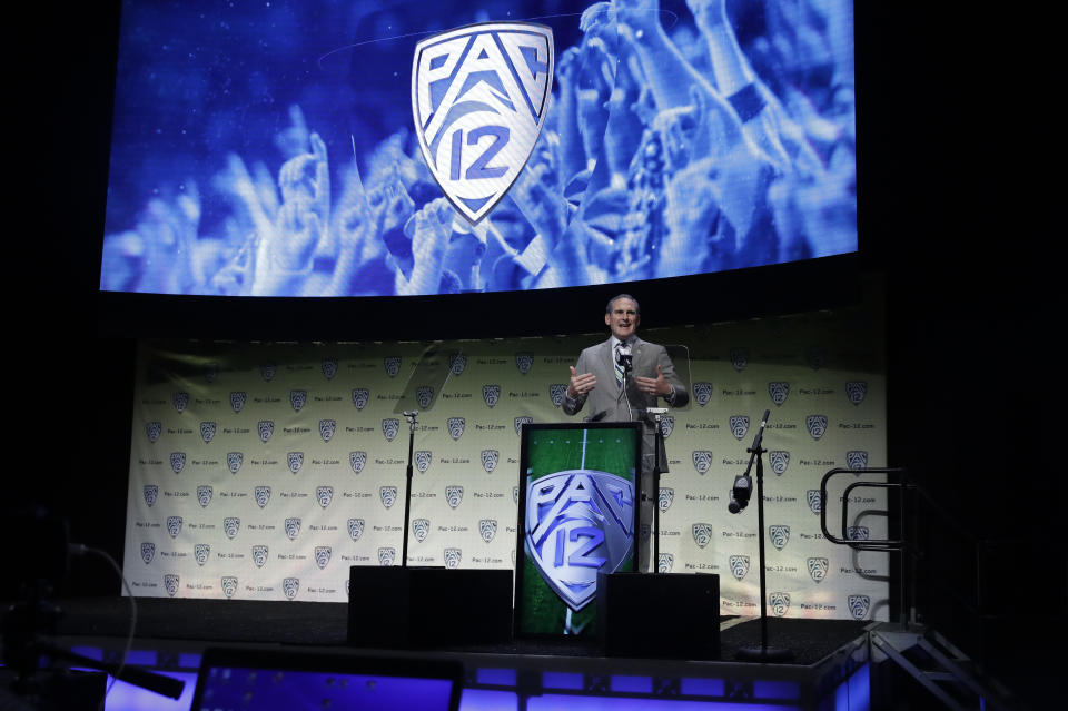 Pac-12 Conference Commissioner Larry Scott speaks during the Pac-12 Conference NCAA college football Media Day Wednesday, July 24, 2019, in Los Angeles. (AP Photo/Marcio Jose Sanchez)