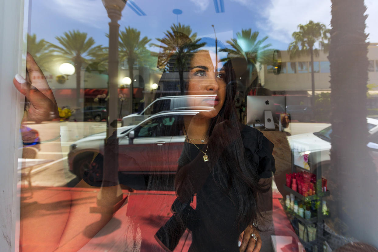 Image: Emily Wands, owner of Lahh Salon in Surfside, Fla., on July 14, 2021. (Saul Martinez / NBC News)