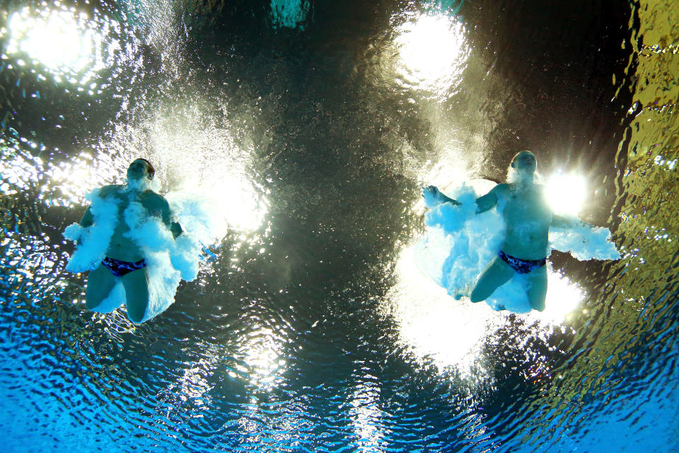 LONDON, ENGLAND - AUGUST 01: Troy Dumais and Kristian Ipsen of the United States compete in the Men's Synchronised 3m Springboard final on Day 5 of the London 2012 Olympic Games at the Aquatics Centre on August 1, 2012 in London, England. (Photo by Clive Rose/Getty Images)