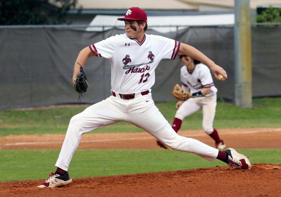 Santa Fe Catholic pitcher Trent Henley pitches against Lake Wales on Tuesday night in the semifinals of the Dan Giannini Hawk Baseball Classic.