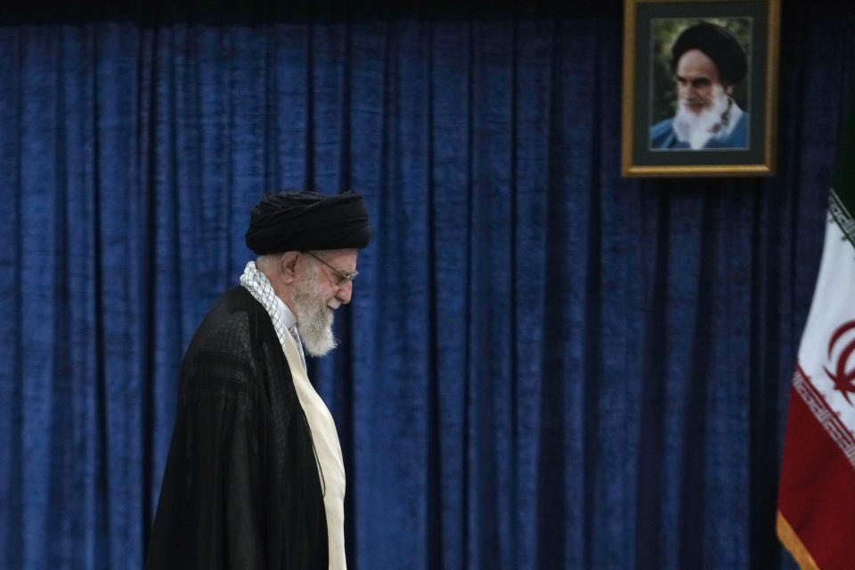 Iranian Supreme Leader Ayatollah Ali Khamenei leaves after casting his vote during the presidential election, in Tehran, Iran, Friday, June 28, 2024. Iranians were voting Friday in a snap election to replace the late President Ebrahim Raisi, killed in a helicopter crash last month, as public apathy has become pervasive in the Islamic Republic after years of economic woes, mass protests and tensions in the Middle East. (AP Photo/Vahid Salemi)