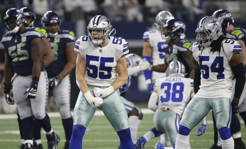 Dallas Cowboys Dallas Leighton Vander Esch (55) and Jaylon Smith (54) celebrate a defensive play against the Seattle Seahawks. (AP)