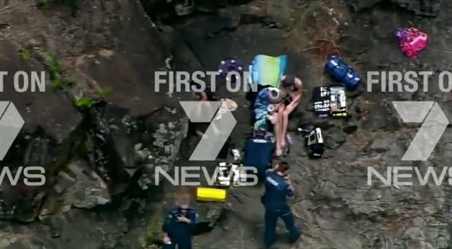 17-year-old being treated by paramedics at the scene. Photo: 7 News