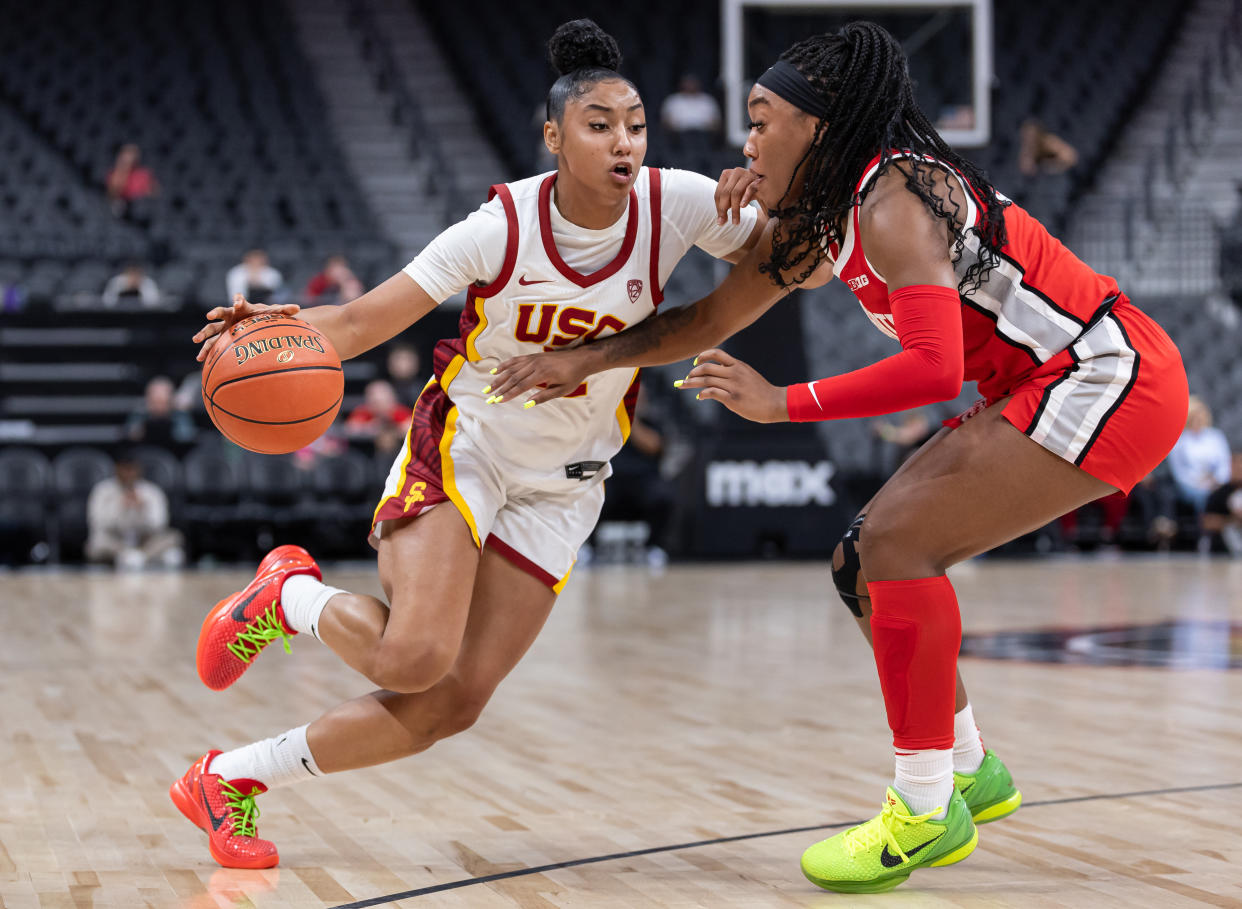 USC's JuJu Watkins drives to the basket against Ohio State's Cotie McMahon during the Naismith Hall of Fame Series at T-Mobile Arena in Las Vegas, on Nov. 6, 2023. (Photo by Michael Hickey/Getty Images)