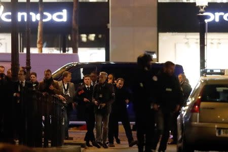 Police conduct an investigation near the Champs Elysees Avenue after a shooting incident in Paris, France, April 20, 2017. REUTERS/Christian Hartmann