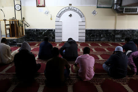 Muslims living in Greece attend Friday prayers at the Masjid Al-Salam makeshift mosque in Athens, Greece, February 3, 2017. REUTERS/Alkis Konstantinidis