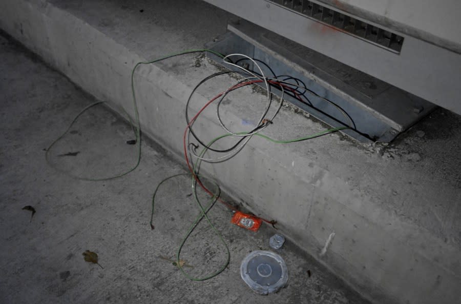 Wires pulled out of dozens of electrical boxes along the 6th street bridge arches after thieves stole copper from the lighting system in December 2023. (Getty Images)