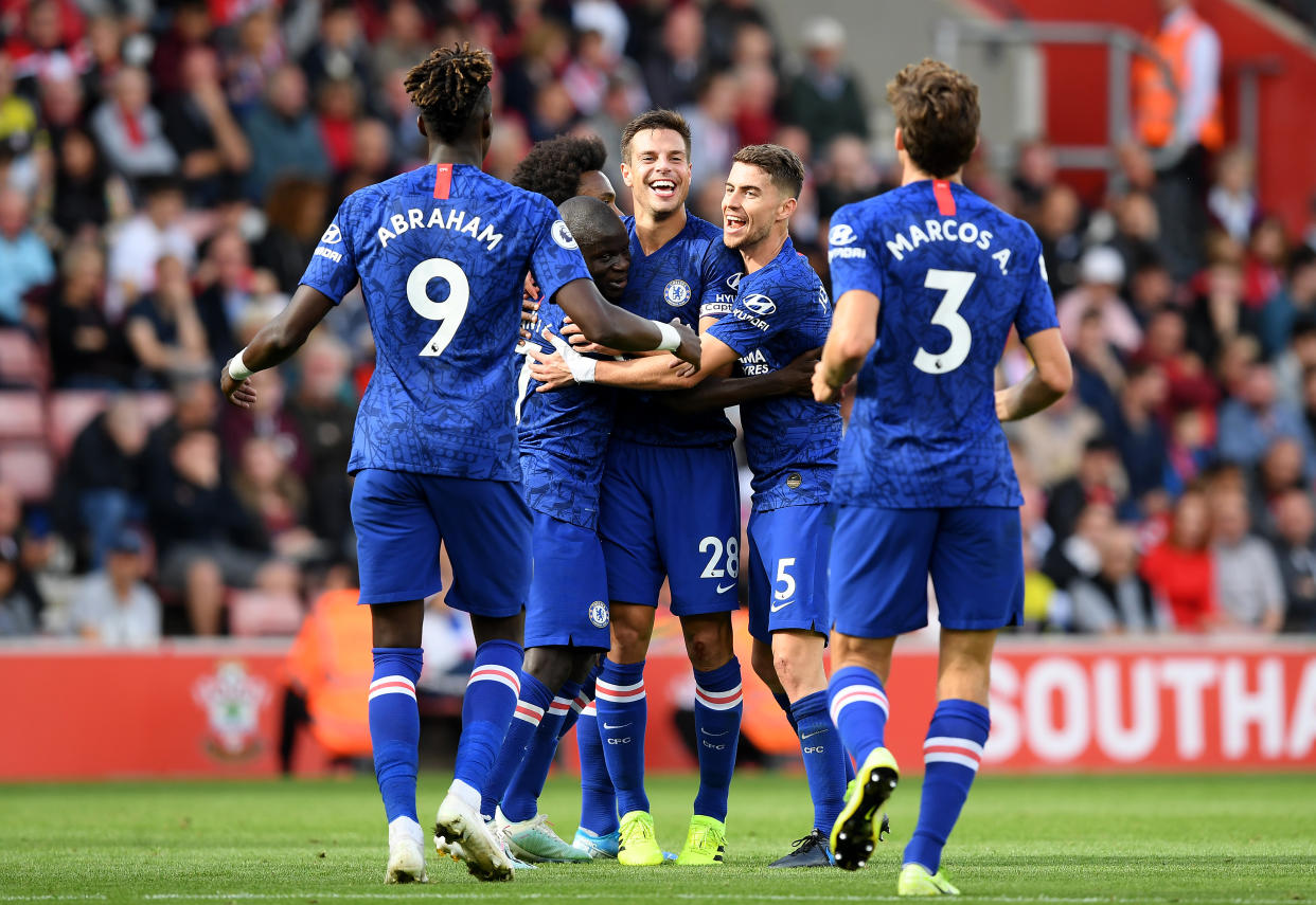 Chelsea players celebrate N'Golo Kante's first-half goal Sunday en route to a 4-1 win at Southampton. (Darren Walsh/Getty)