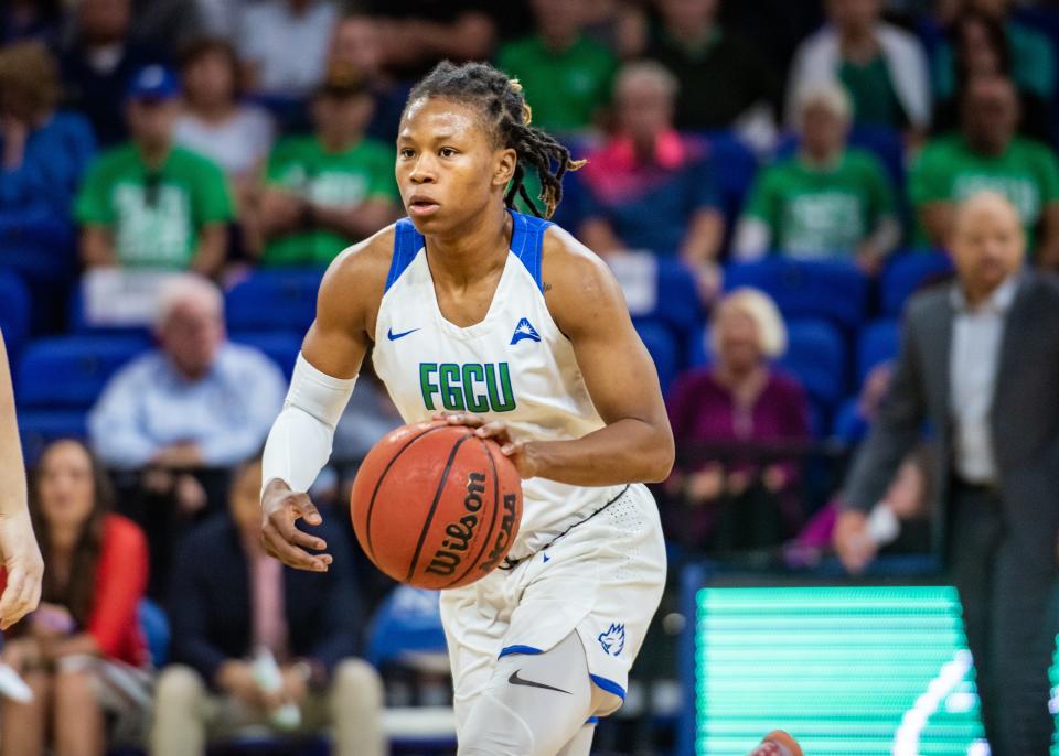 FGCU's Keri Jewett-Giles brings the ball up court against North Florida.