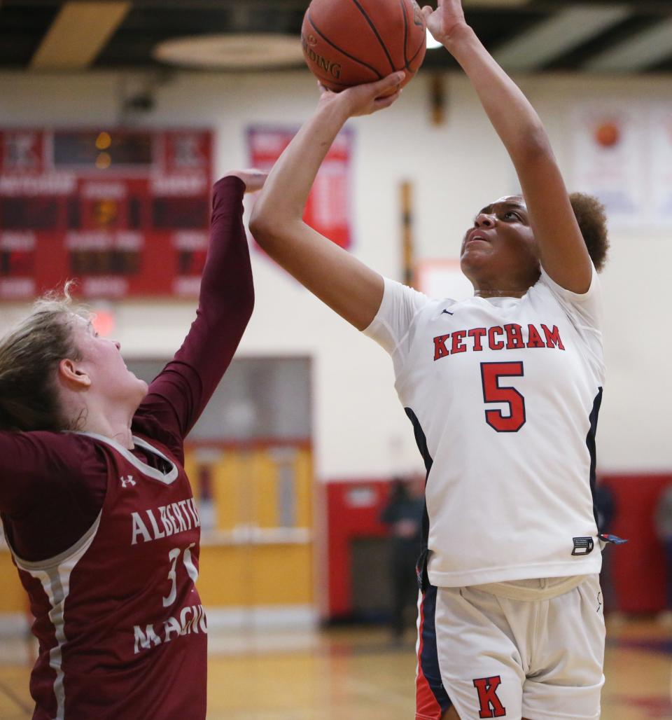 Roy C. Ketcham's Nia Rencher goes up for a shot against Albertus Magnus' Karly Fischer during Thursday's girls basketball game on January 26, 2023.